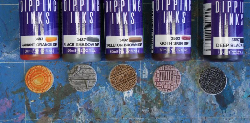 peanas con diferentes colores de dipping inks